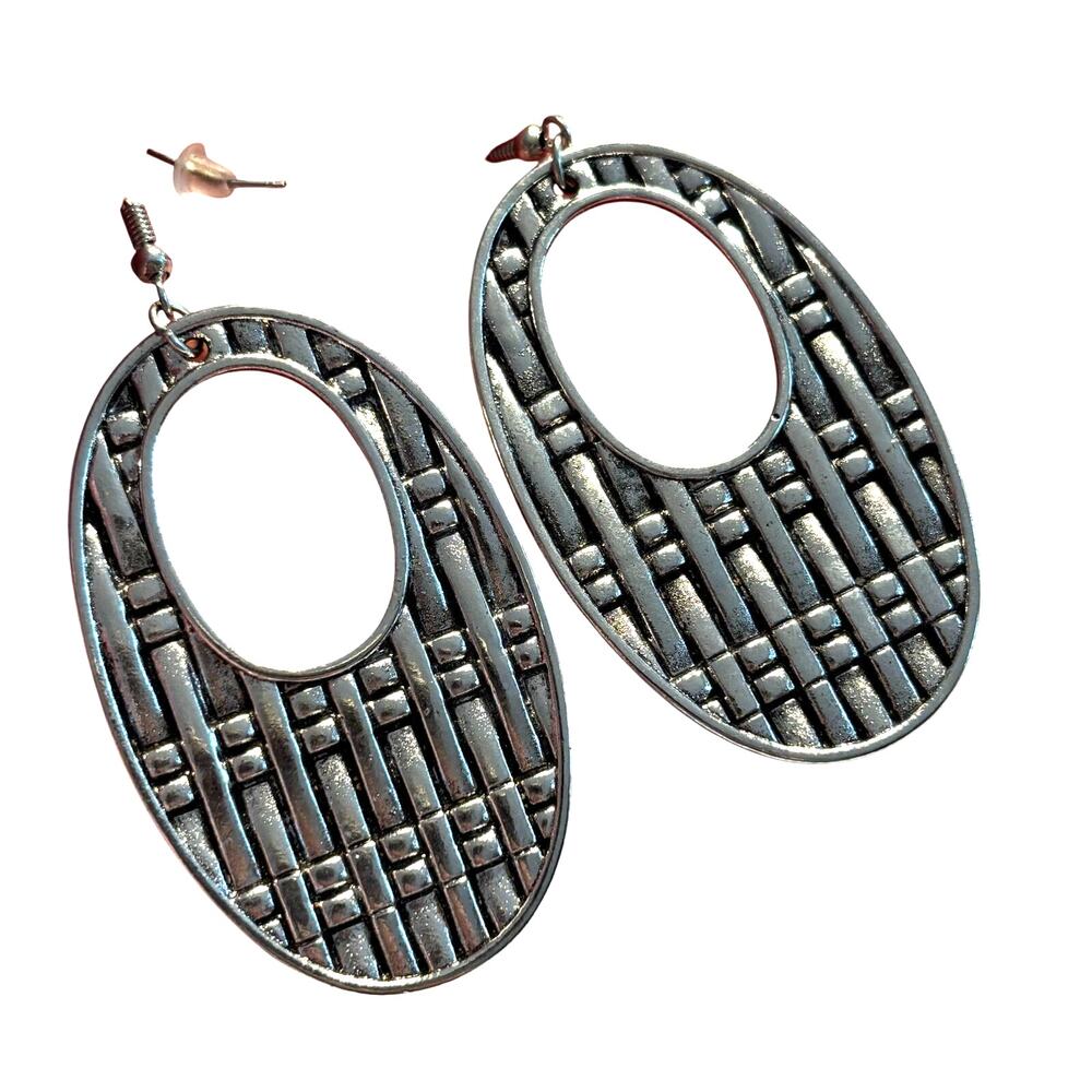 Textured dangle & drop pierced earrings silver textured ovals mod runway fashion